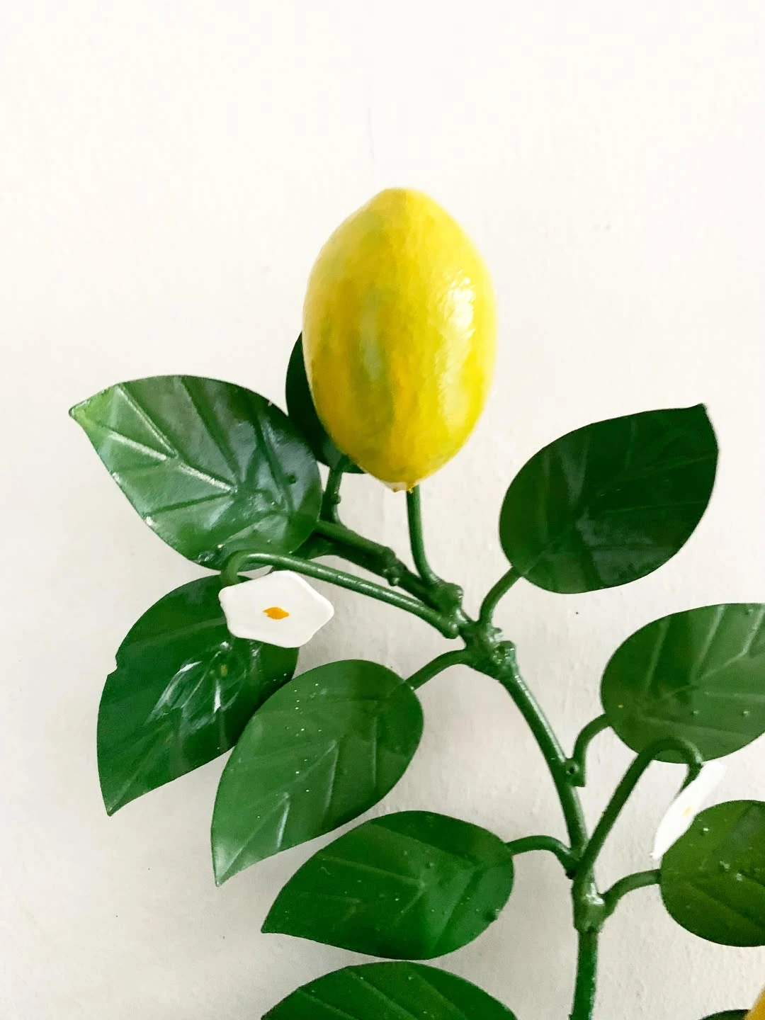 vintage-electric-wall-sconce-lit-featuring-citrus-lemon-design-warm-cozy-lighting-atmosphere